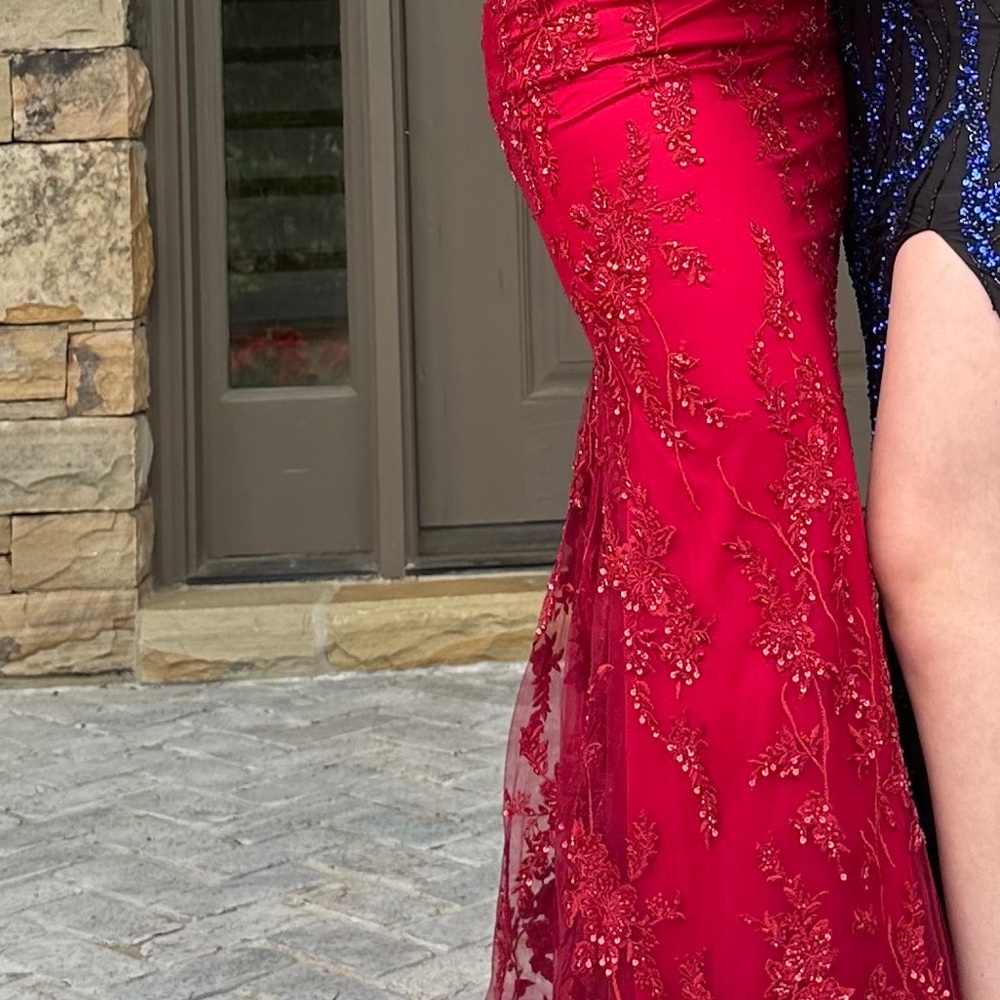 Elegant Red Lace Prom Gown with intricate detailing